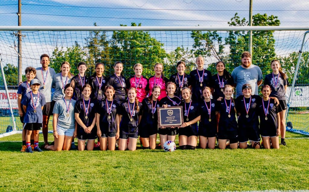 Eastern Mennonite poses for a photo after their state championship win against New Covenant.