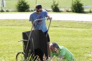 Yard work at Valley Brethren Mennonite Heritage Center. 