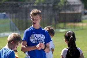 Older students help out at the elementary school's annual field day.
