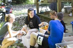 Packing boxes at a local Community Supported Agriculture site. 