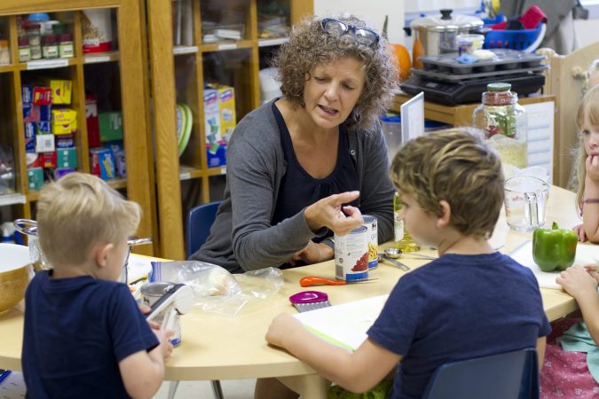 Lynette Mast often facilitates snack preparation with the kindergarten class.