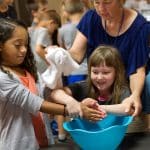 Washing each others' hands as a symbol of service to others