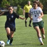Eastern Mennonite’s Ava Galgano (11) gets ahead of Fredericksburg Christian’s Catie Jones on Wednesday during the Flames’ 2-0 loss in the VISAA Division II girls soccer quarterfinals at EMHS.

Jim Sacco / DN-R