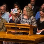 Maria Archer shares a card created by one of the graduating seniors in honor of her birthday in 2006.