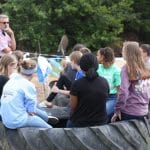 Seventh grade earth science class helps incorporate salvaged tires into the elementary playground
