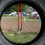 Seventh grade earth science class helps incorporate salvaged tires into the elementary playground