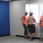 EMES Building renovation tour; Hannah Bailey (1st grade teacher), Maria Archer (principal) and Gini Trotter (counselor, peacebuilding and gardening teacher)