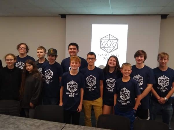 Mason Ritchie '23, second from back on the right, and his teammates who took third in the 2019 Game Jam coding event at JMU.