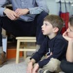 Babar family visit to kindergarten room to talk about their home country of Pakistan and share some special food.