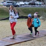 Sarah DeBrun Mitch, 7th grade STEAM and high school biology teacher, with her two EMES students