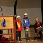 Fifth grade students handed thank you cards to the contractors.