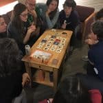 Late night game of Code Names among EMS faculty and staff.