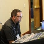 Mike Stoltlzfus, director of business affairs, runs tech for the conference