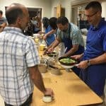 Paul Leaman, serves a omelet during the annual faculty/staff breakfast at the start of the 2018-19 school year. 