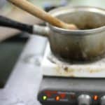 Lee Good, making tin cloth for a distance learning video lesson