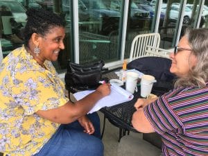 Debbie Katz, high school counselor, and Maria Archer, then K-8 principal, plan for a meeting of the Racial Equity Working Group (later renamed the Equity Work Group).