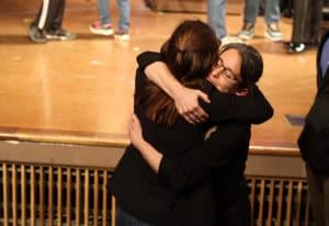 Jodi Hertzler, drama coordinator, celebrating with a cast member, Little Women