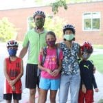 Hannah Metlzer, new to 6th grade, is dropped off by her parents and siblings on the first day