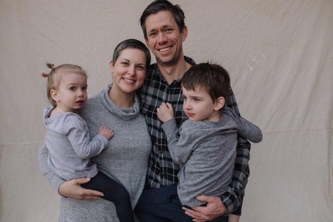 Andrew Jenner '00, Community Engagement Award in 2020, with Rachel and their children.