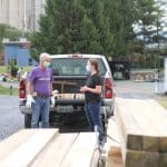 Volunteer Ethan Zook consults with stage manager Hannah Hendricks '22.