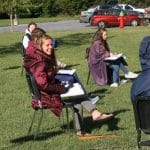 Choir practicing outdoors for COVID mitigation, fall 2020