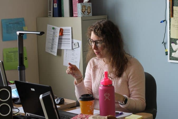 Lizzy Miller teaching a high school math class from her classroom.