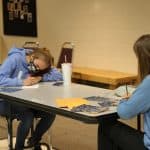 Safely distanced and masked, Christmas Fund Drive letter writing. 