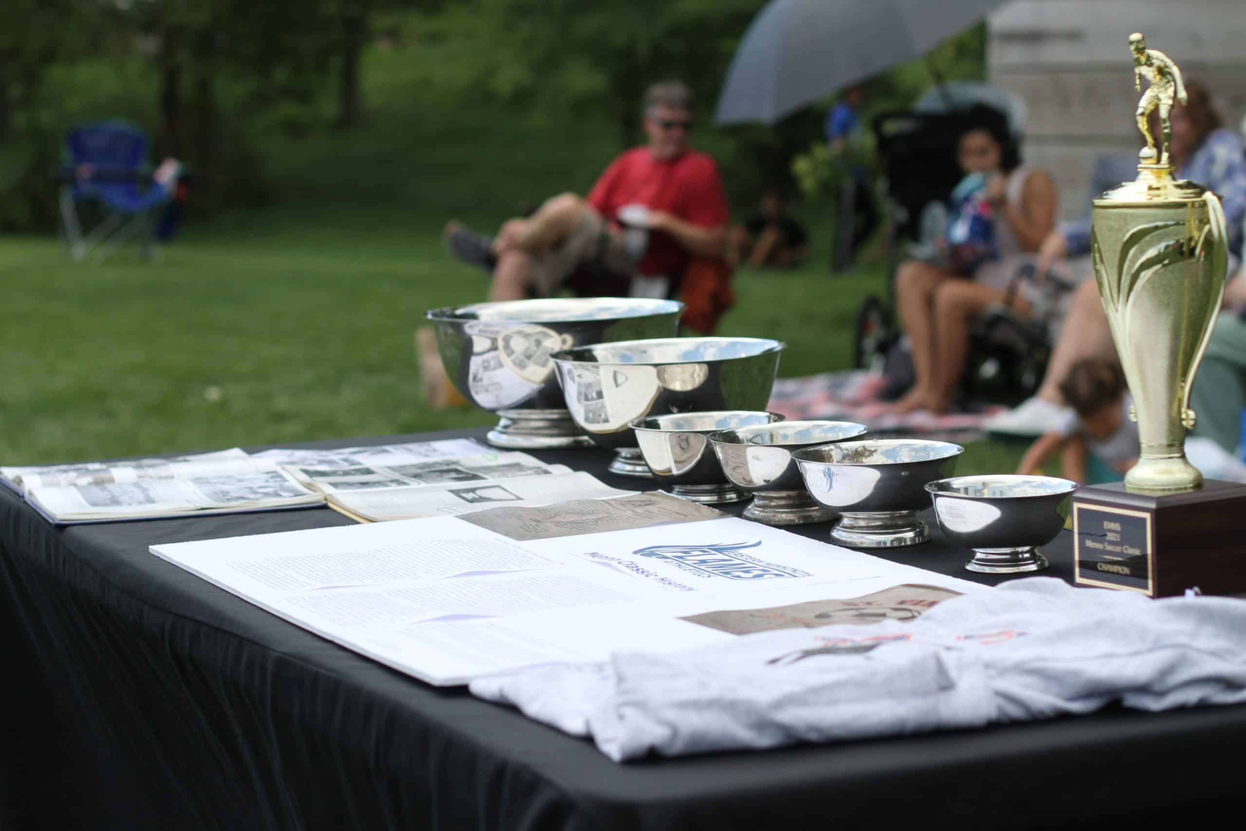 EMS display highlighting 50 years of boys varsity soccer tournaments at the 50th anniversary of the Menno Classic and precursor tournaments.