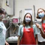 We Serve members with sponsor Marsha Thomas help with Homecoming Breakfast clean up.