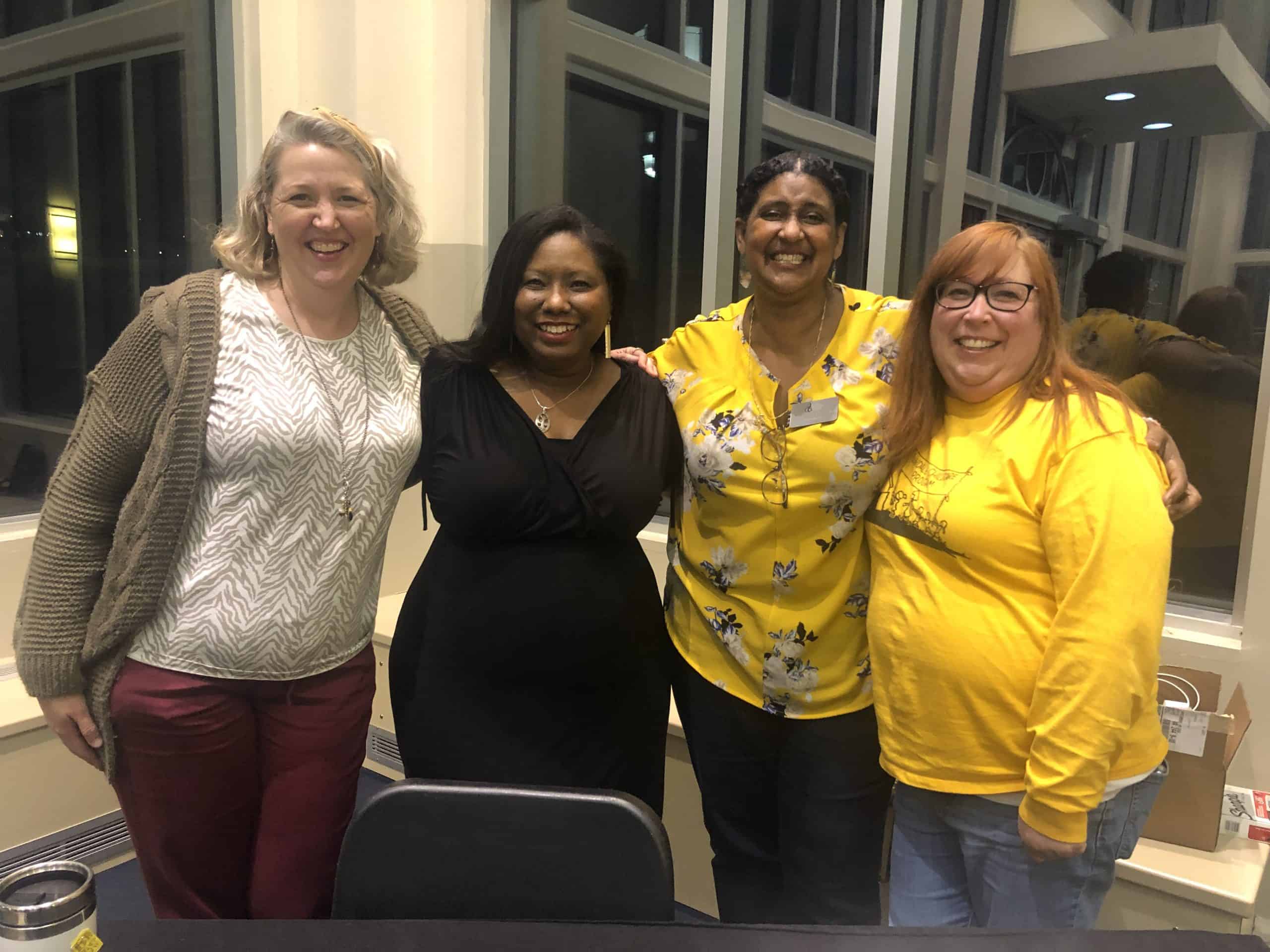 Jana Byer, Osheta Moore, Debbie Katz, and Teresa Horst after Moore's public presentation Monday evening