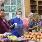 Dining hall crew doing their magic for a hungry crowd