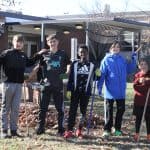 6th graders raked leaves around the school and in the neighborhood