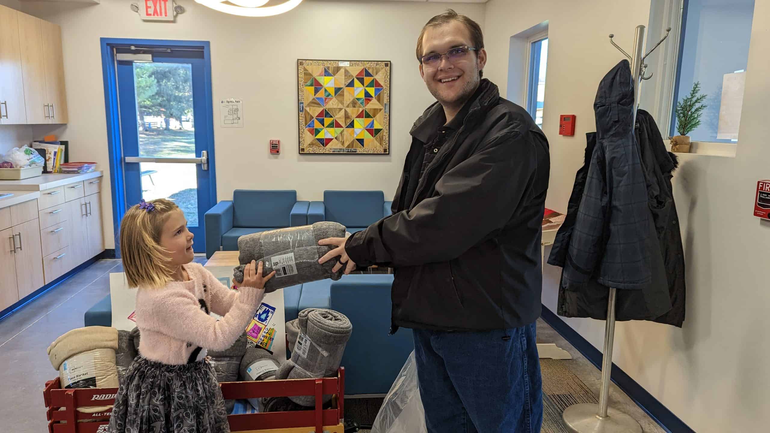 EMES students collected 32 blankets for the Open Doors homeless ministry in Harrisonburg this fall.