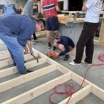 Constructing exterior walls for the MDS house in Hurley, Va., spring 2023