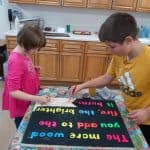 Title: Cozy Fire
Size: 24”x18”
Medium: acrylic paint
Description: 4th grade artists brainstormed and voted on an inspirational saying to serve as the centerpiece of their painting. Next, they collaborated to determine the color scheme and design. This was an important exercise in both sharing and listening respectfully. Students worked in small groups to draw and paint the composition. As the final step in their creative process, the class brainstormed title ideas for their piece then voted for their favorite.
