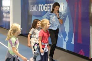 Middle school student helped with a health fair at EMU